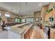 Well-lit kitchen features granite countertops, stainless steel appliances, and seamless flow into the living area at 4 Annadale Ct, Henderson, NV 89052