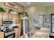 A gourmet kitchen features granite countertops, stainless steel appliances and decorative elements at 4 Annadale Ct, Henderson, NV 89052