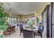 Beautiful open-concept living room with dining area, breakfast bar, and natural light from the large window at 4 Annadale Ct, Henderson, NV 89052