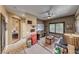 Cozy living room with vintage decor, sofa, and ceiling fan at 4 Annadale Ct, Henderson, NV 89052