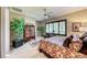 A well-decorated main bedroom with window, ceiling fan, dresser, and stylish furniture at 4 Annadale Ct, Henderson, NV 89052