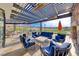 Inviting outdoor patio featuring comfortable seating and views of the golf course at 4 Annadale Ct, Henderson, NV 89052