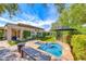 Inviting pool and patio with ample seating, ideal for outdoor entertaining at 4 Annadale Ct, Henderson, NV 89052