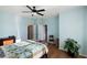 Bedroom featuring wooden floors, a ceiling fan, and lots of interior space at 4350 Westbury Square St # 3, North Las Vegas, NV 89032
