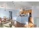 Bright, open kitchen with stainless steel appliances, granite countertops, and a breakfast bar at 4350 Westbury Square St # 3, North Las Vegas, NV 89032