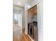 Convenient laundry area with modern washer and dryer units, shelving, and easy access to other rooms at 4350 Westbury Square St # 3, North Las Vegas, NV 89032