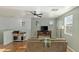 Comfortable living space with hardwood floors, a ceiling fan, and generous natural light at 4350 Westbury Square St # 3, North Las Vegas, NV 89032