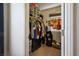 Organized walk-in closet offering storage solutions and ample space for clothes and accessories at 4610 Lime Straight Dr, Las Vegas, NV 89115