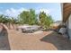 Spacious backyard area showcasing a boat and an array of motorcycles at 4870 E Colorado Ave, Las Vegas, NV 89104