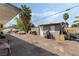 Backyard featuring multiple vehicles, including boats and truck, and a shed providing ample storage at 4870 E Colorado Ave, Las Vegas, NV 89104