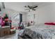 Bright bedroom with fan, desk, and ample closet space for convenient storage at 4870 E Colorado Ave, Las Vegas, NV 89104