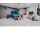 The bedroom has tile flooring and modern decor, offering a restful retreat at 4870 E Colorado Ave, Las Vegas, NV 89104
