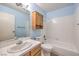 Cozy bathroom with a shower, bathtub, and vanity cabinet at 5068 Jeffreys St # 202, Las Vegas, NV 89119