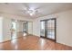 Bedroom featuring mirrored closet doors and sliding glass doors to an outdoor space at 5068 Jeffreys St # 202, Las Vegas, NV 89119