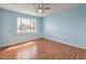 Light-filled bedroom featuring laminate floors and a big bay window at 5068 Jeffreys St # 202, Las Vegas, NV 89119