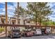 Convenient covered parking area with mature landscaping around the building at 5068 Jeffreys St # 202, Las Vegas, NV 89119