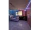 This bedroom features tile floors, a bed, and multi-colored walls at 5594 Ricochet Ave, Las Vegas, NV 89110