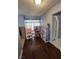 Living room with hardwood floors and brick fireplace at 5594 Ricochet Ave, Las Vegas, NV 89110