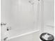 Bright bathroom with a shower-tub combo and Rock 'n' Roll toilet seat cover at 600 N Carriage Hill Dr # 1008, Las Vegas, NV 89138
