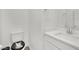 Bathroom featuring a modern vanity with a sink, toilet, and Rock and Roll toilet seat at 600 N Carriage Hill Dr # 1008, Las Vegas, NV 89138