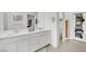 Elegant bathroom featuring double vanity sinks and modern decor throughout the space at 600 N Carriage Hill Dr # 1008, Las Vegas, NV 89138