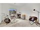 Bedroom with a drum set, office desk, chair, and window offering natural light at 600 N Carriage Hill Dr # 1008, Las Vegas, NV 89138