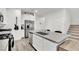 Bright kitchen featuring stainless steel appliances, quartz countertops, and a stylish island at 600 N Carriage Hill Dr # 1008, Las Vegas, NV 89138