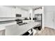 Charming kitchen showcasing a center island with seating and stainless steel appliances at 600 N Carriage Hill Dr # 1008, Las Vegas, NV 89138