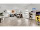 Bright living room with modern decor, wood floors, and a comfortable sectional sofa at 600 N Carriage Hill Dr # 1008, Las Vegas, NV 89138
