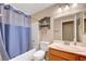 Standard bathroom with shower, tub, toilet, sink and mirror at 6131 Cozy Creek St, North Las Vegas, NV 89031