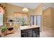 Bright kitchen featuring a center island and plenty of natural light at 6131 Cozy Creek St, North Las Vegas, NV 89031