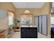 Well-appointed kitchen featuring a center island and stylish design elements at 6131 Cozy Creek St, North Las Vegas, NV 89031