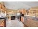 Modern kitchen equipped with stainless steel appliances and ample counter space at 6131 Cozy Creek St, North Las Vegas, NV 89031