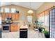 Well-lit kitchen with a modern appliance package and stylish island at 6131 Cozy Creek St, North Las Vegas, NV 89031