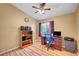 Home office with desk, speakers, filing cabinet and natural light at 6131 Cozy Creek St, North Las Vegas, NV 89031