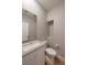 Modern bathroom with updated vanity, sink, faucet, and toilet at 6145 May River St, Las Vegas, NV 89148