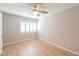 Light and airy bedroom with ceiling fan and shuttered windows at 6145 May River St, Las Vegas, NV 89148