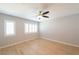 Bedroom with hardwood floors, neutral walls, and shuttered windows at 6145 May River St, Las Vegas, NV 89148