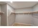 Walk-in closet with wall-mounted shelving at 6145 May River St, Las Vegas, NV 89148