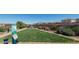 Community dog park features green space, benches, waste disposal stations, and pet-friendly amenities at 6145 May River St, Las Vegas, NV 89148
