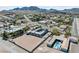 High-angle view showcasing a home with a courtyard pool, generous lot size, and neighborhood setting at 647 Foxhall Rd, Henderson, NV 89002