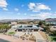 Beautiful aerial shot of home with well-manicured landscaping, desert landscape and mountain views at 647 Foxhall Rd, Henderson, NV 89002