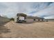 This property includes a large carport for RV parking, a long driveway, and a spacious lot at 647 Foxhall Rd, Henderson, NV 89002