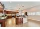 Spacious kitchen features custom cabinetry, an island with bar seating and modern appliances at 647 Foxhall Rd, Henderson, NV 89002