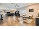 Expansive living room with hardwood floors, ample seating, and elegant decor at 647 Foxhall Rd, Henderson, NV 89002