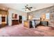 Spacious main bedroom featuring plank wall, ensuite bathroom, and walk-in closet at 647 Foxhall Rd, Henderson, NV 89002