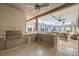 Fully equipped outdoor kitchen with a built-in grill, cabinets, and a counter, perfect for entertaining guests at 647 Foxhall Rd, Henderson, NV 89002