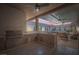 Inviting outdoor kitchen with stainless steel grill, countertop, and seating area perfect for entertaining at 647 Foxhall Rd, Henderson, NV 89002