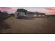 Spacious RV parking area with covered shelter, providing convenient and secure storage at 647 Foxhall Rd, Henderson, NV 89002