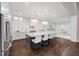 Bright kitchen with stylish island, stainless steel appliances, and sleek white cabinetry at 6700 Regency Stone Way, Las Vegas, NV 89148